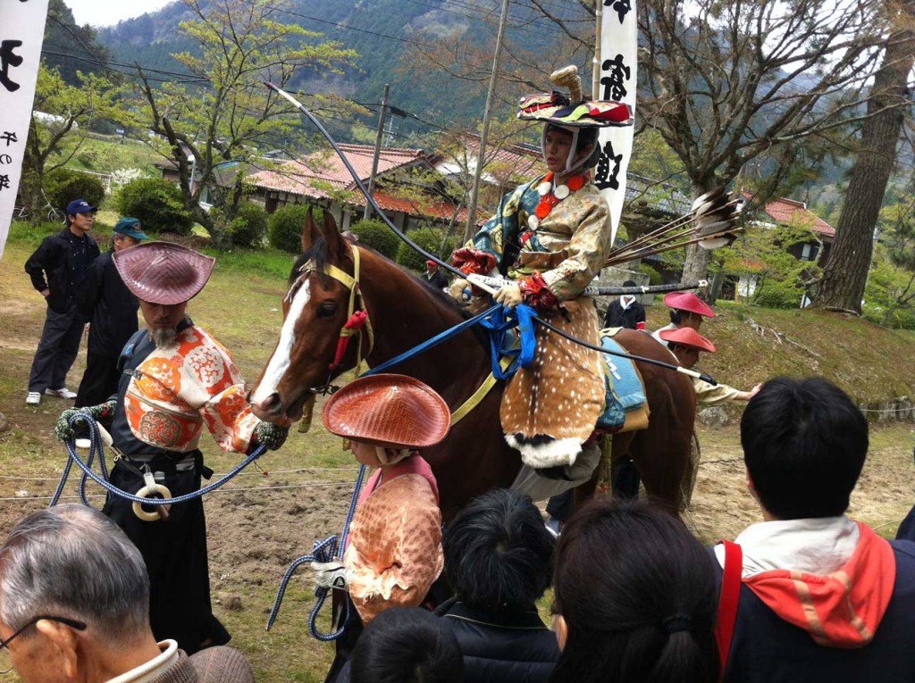 A Yabusame archer in traditional finery and armor.