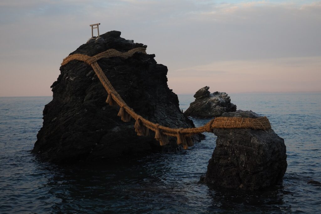 brown wooden dock on body of water during daytime. Mie Prefecture